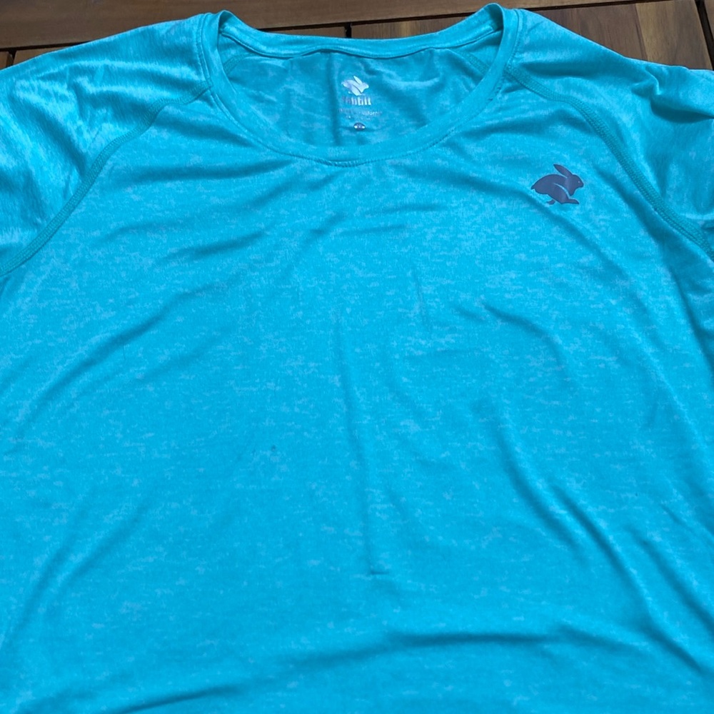Rabbit top for running or wearing. Worn once. Size L